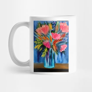 A lovely boutique of abstract vibrant bright colorful  flowers in a tall turquoise glass vase Mug